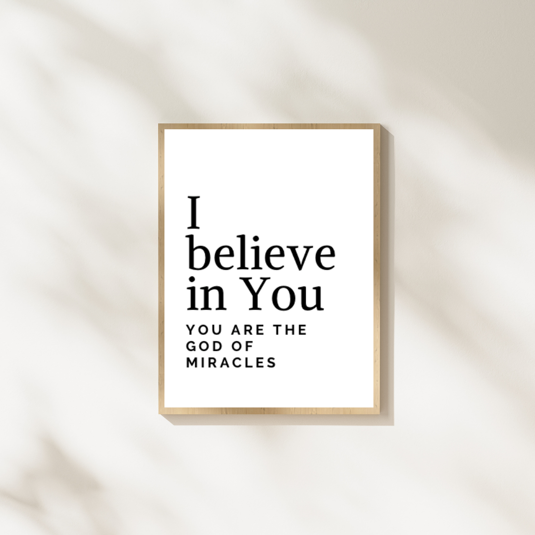 Minimalist Christian wall art print with the quote ‘I Believe in You – You Are the God of Miracles’ in black and white design